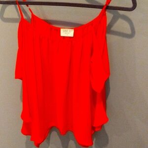 Sienna sky size small. Scarf style blouse, adjustable straps.